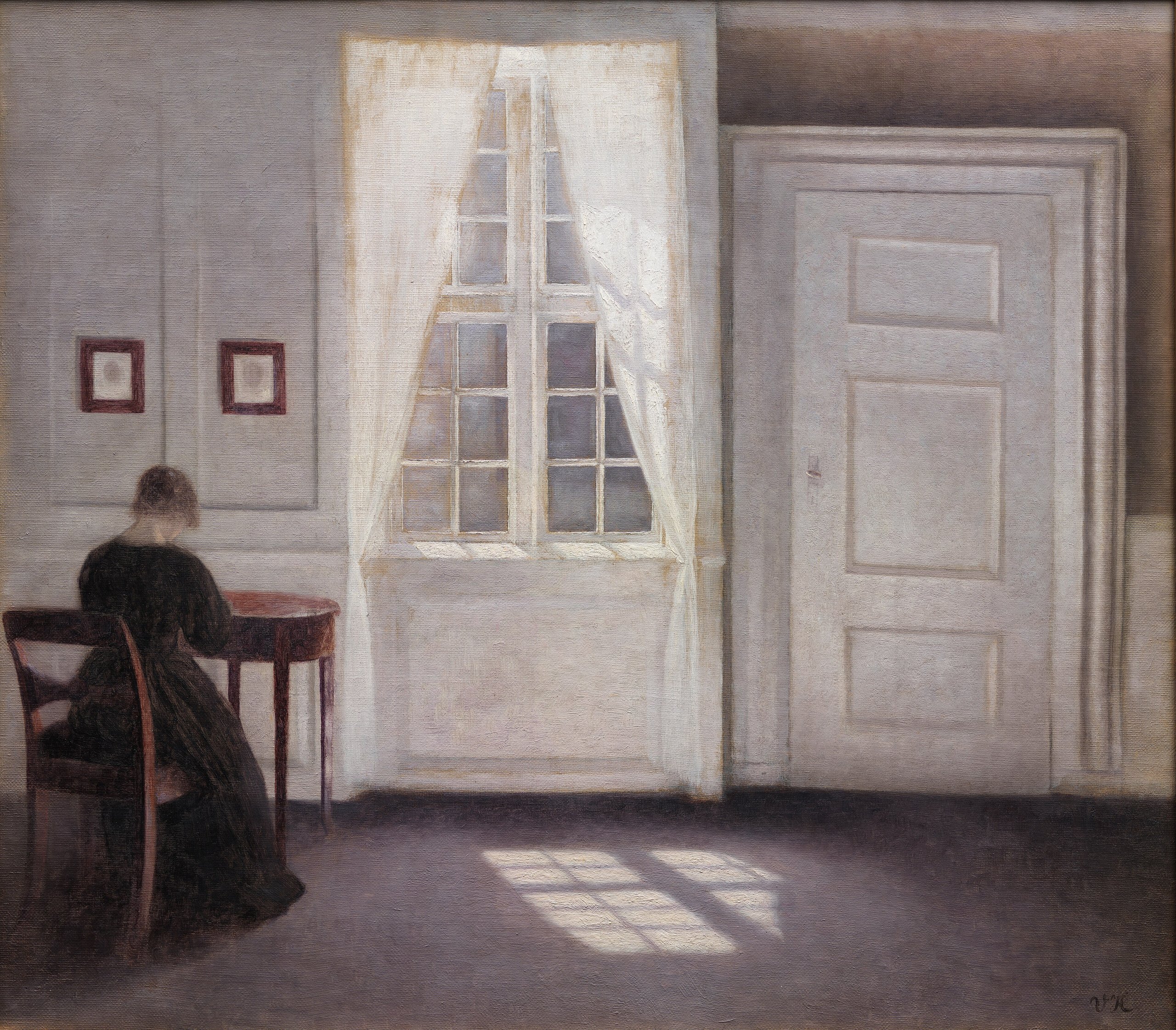 Interior in Strandgade by Vilhelm Hammershoi, a woman with her back turned, a shut door, and window light laid in bars across an empty floor